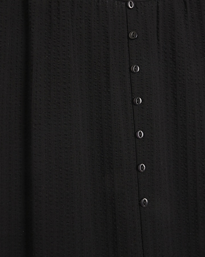 Black textured button jumpsuit