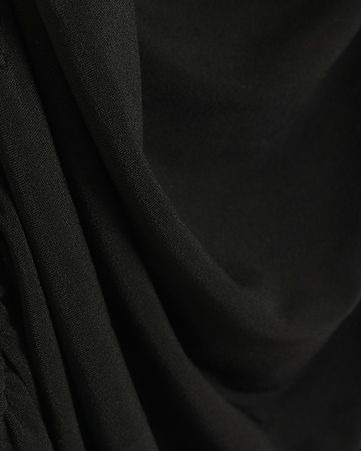Black drape asymmetric top