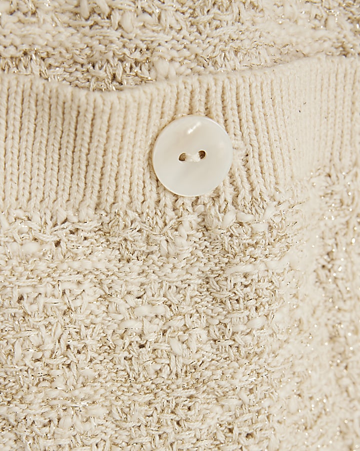 Cream knit oversized sleeveless cardigan