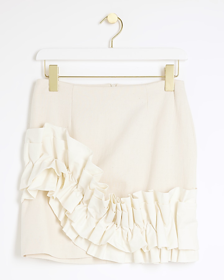 Cream ruffle mini skirt