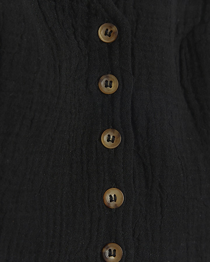 Black textured button halter neck top