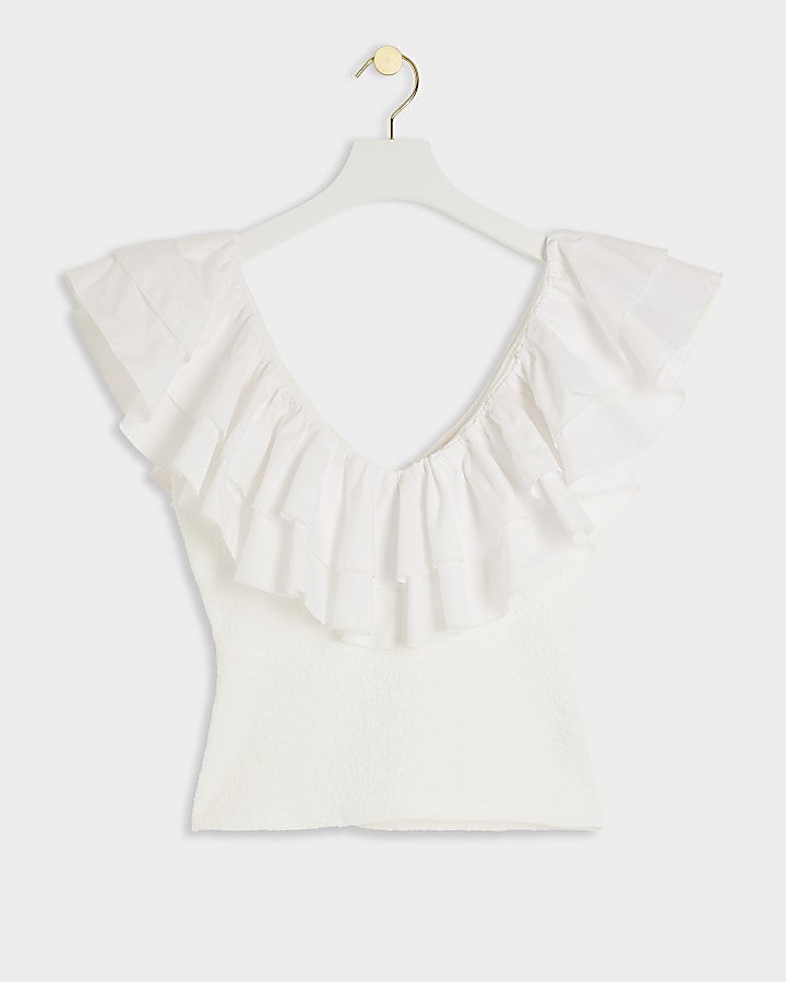 White textured frill top
