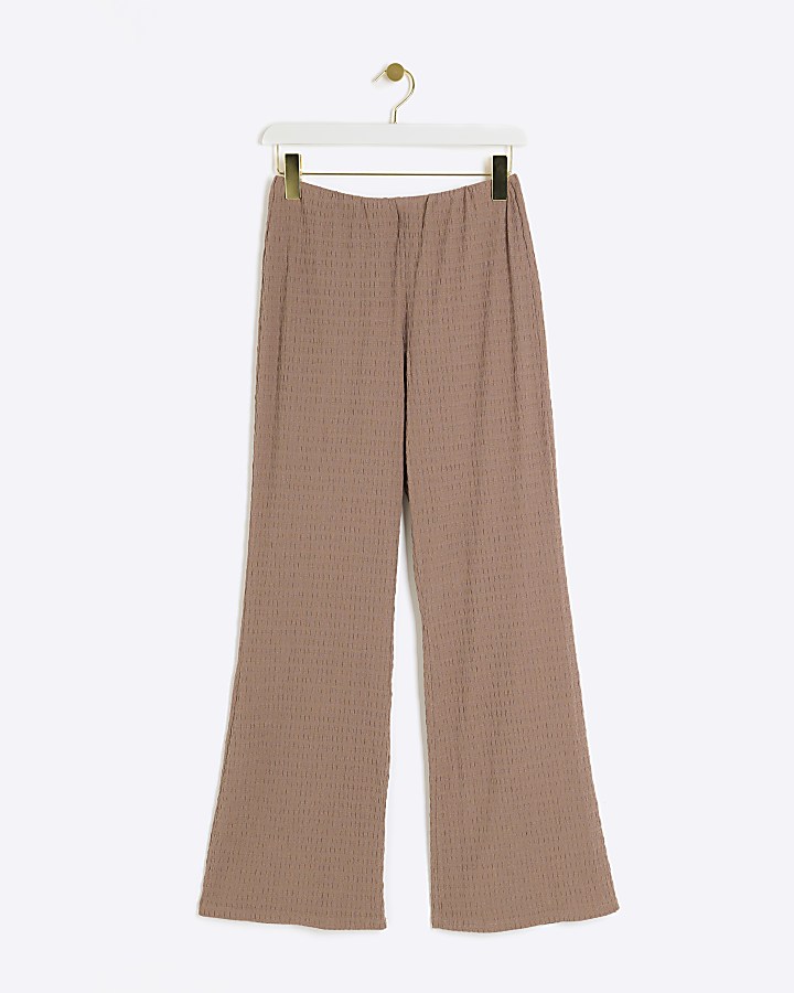 Brown textured flared trousers
