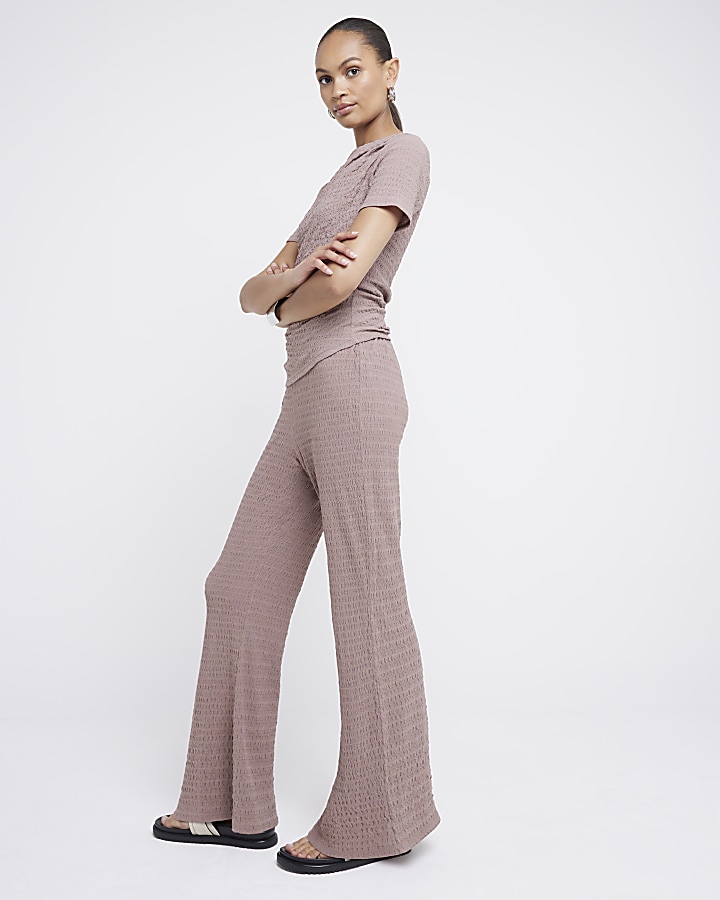 Brown textured flared trousers