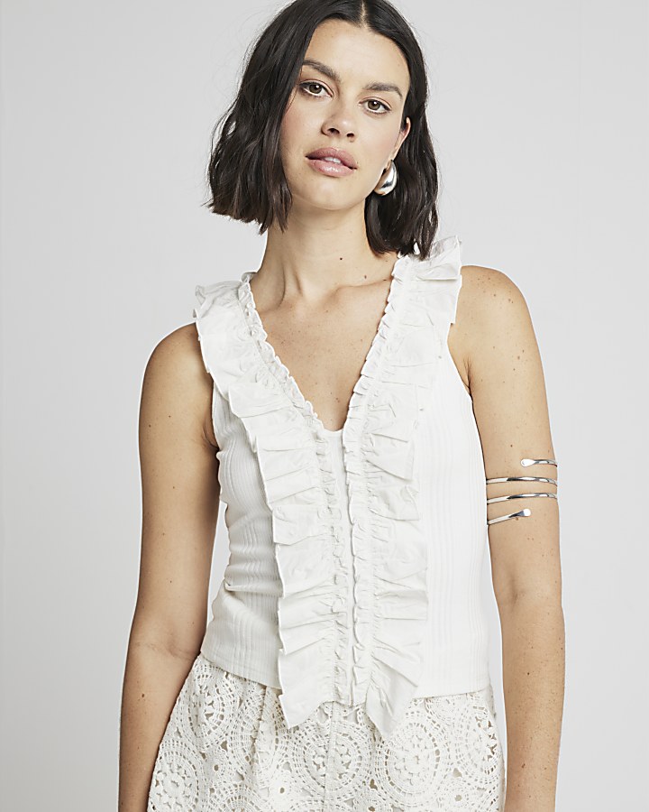 Cream ruffle detail ribbed tank top | River Island