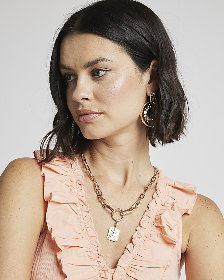 Pink ruffle detail ribbed tank top | River Island