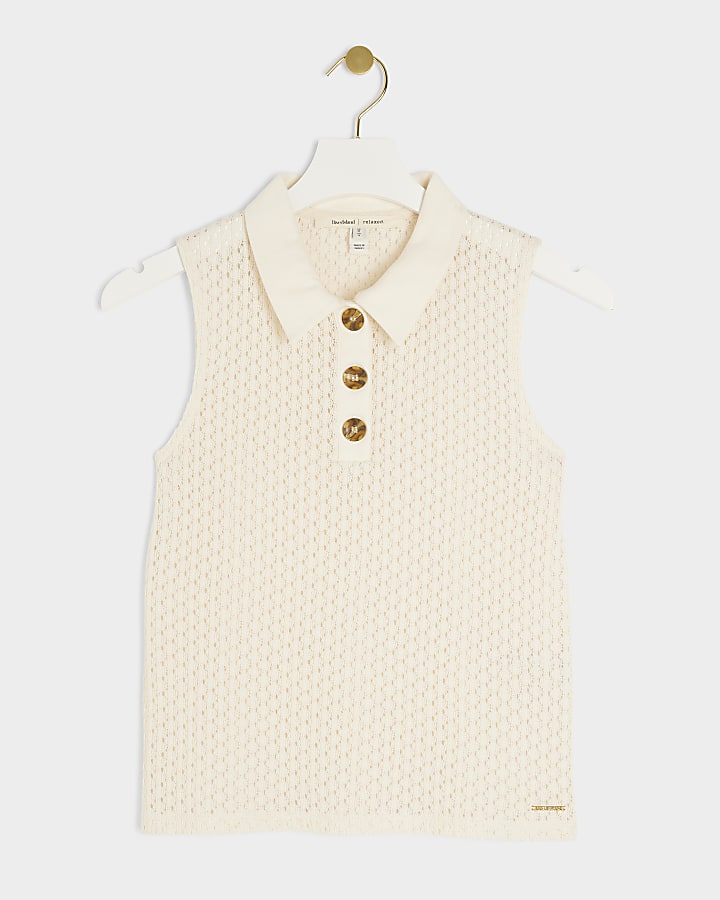 Cream sleeveless crochet polo top