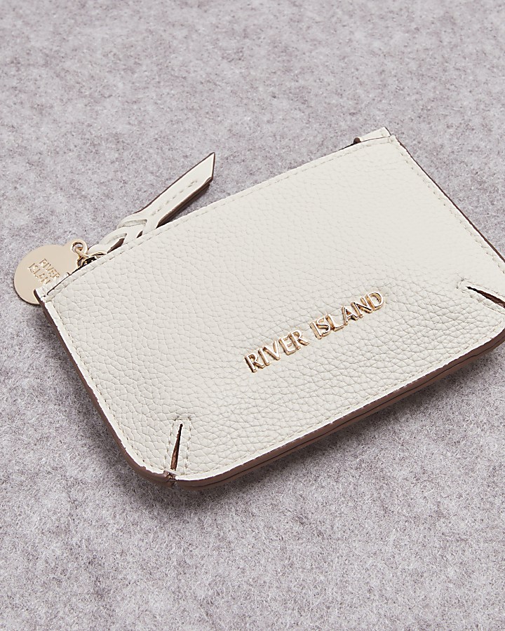 Cream textured pouch purse