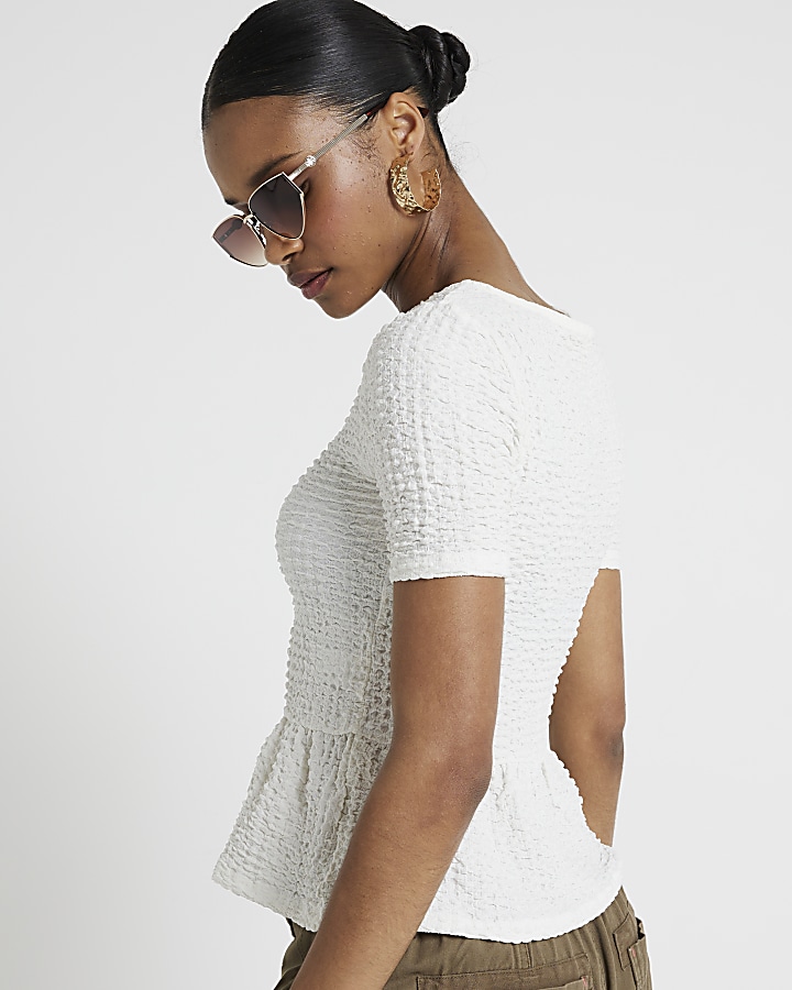 Cream textured peplum t-shirt