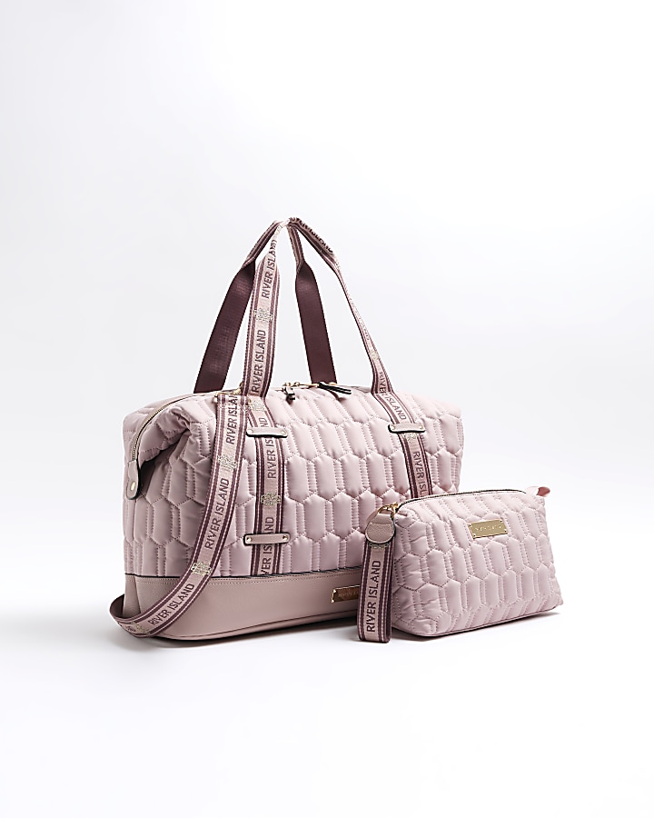 Pink quilted travel and makeup bag