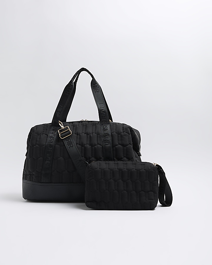 Black quilted travel and makeup bag