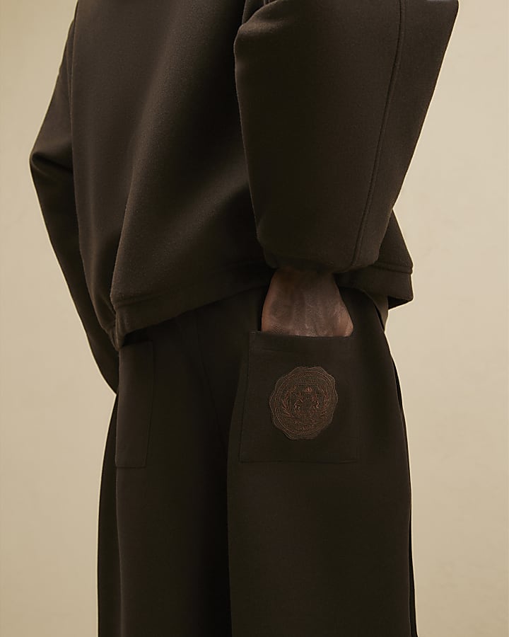 Brown Crest Pleated Barrel Leg Joggers