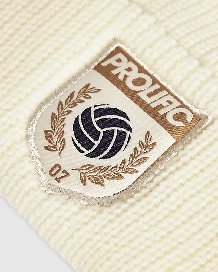 Cream Knit Prolific Badged Beanie