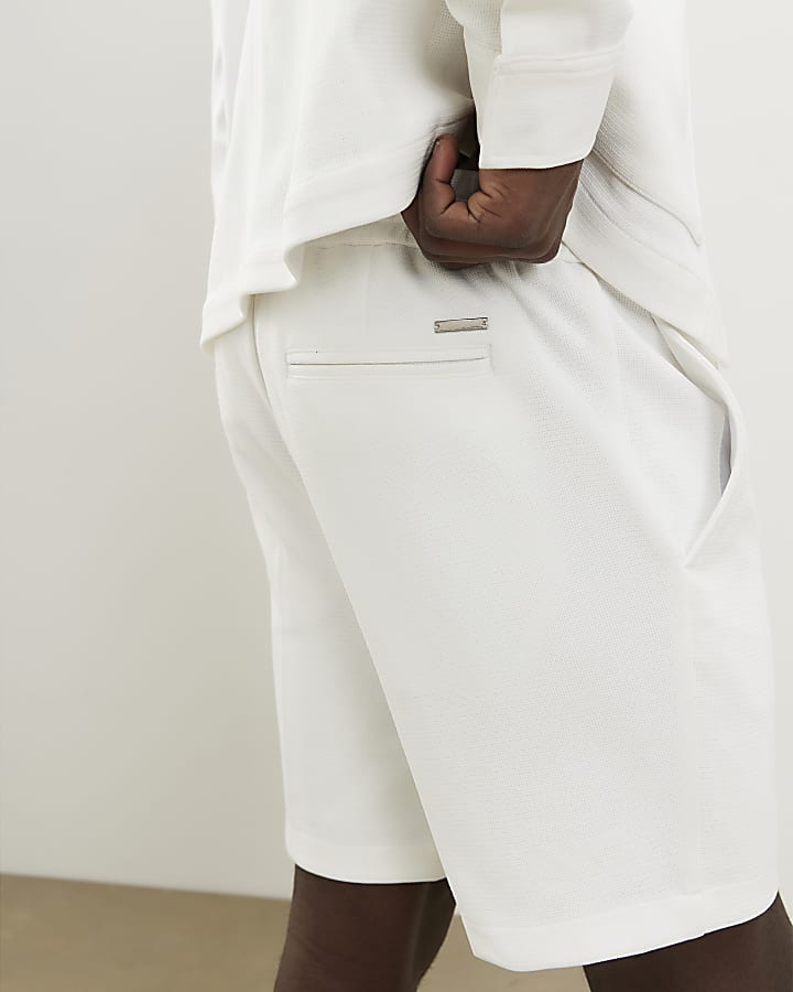 White Slim Fit Textured Shorts