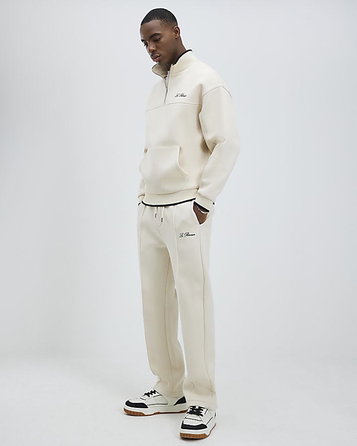 Cream Regular Fit Embroidered Joggers