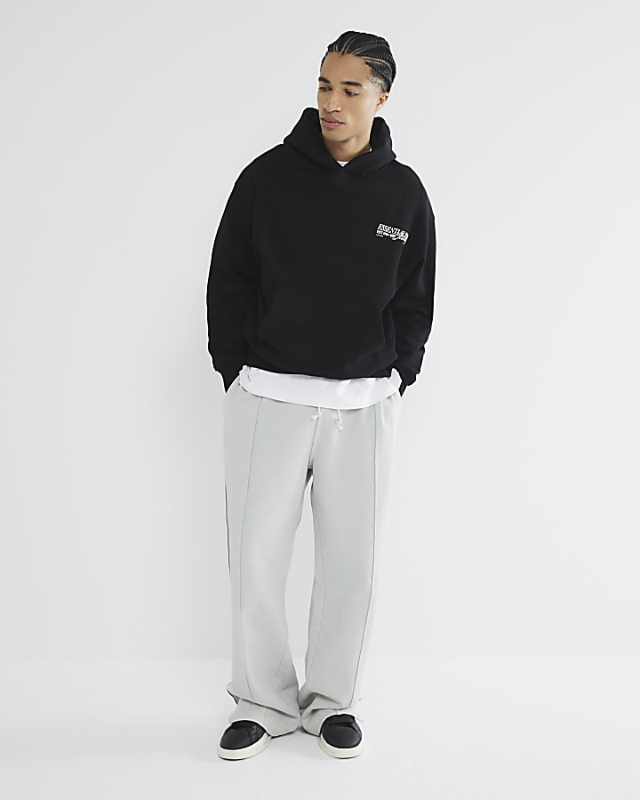 Black Oversized Essentialism Hoodie