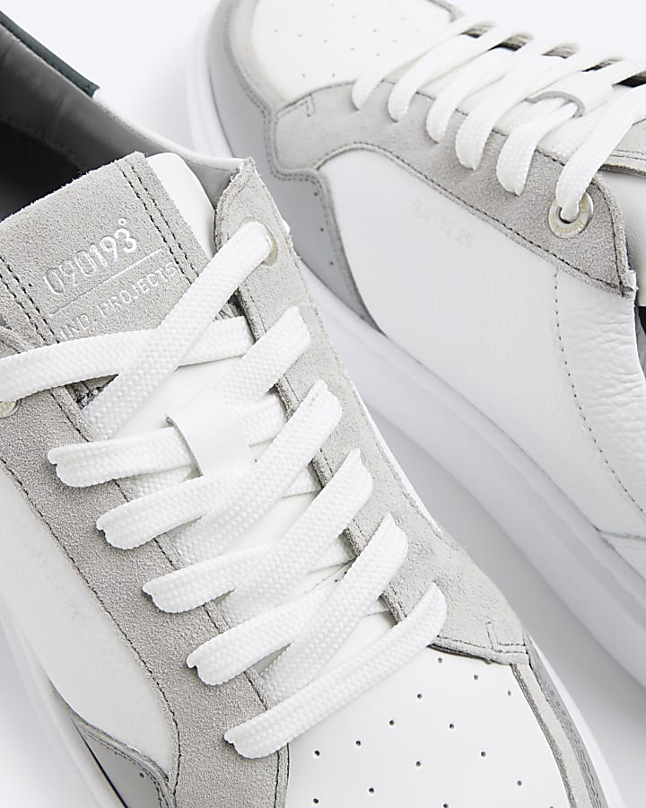 White leather lace up trainers