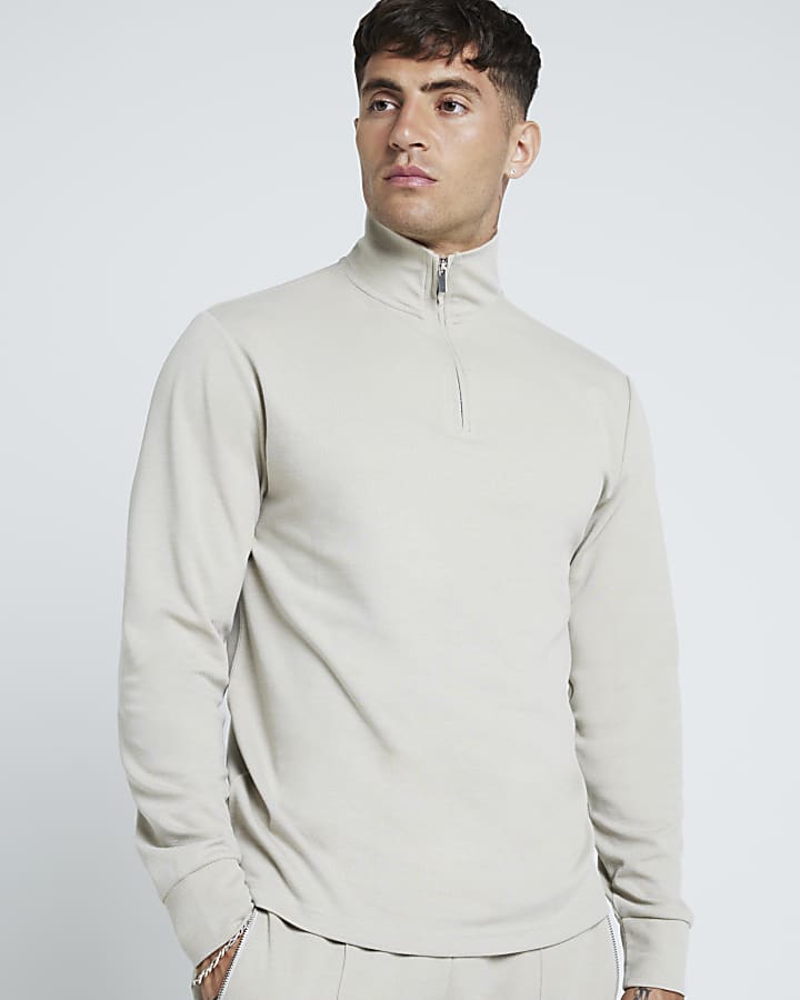 Beige slim fit textured half zip sweatshirt