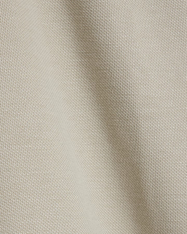 Beige slim fit textured half zip sweatshirt