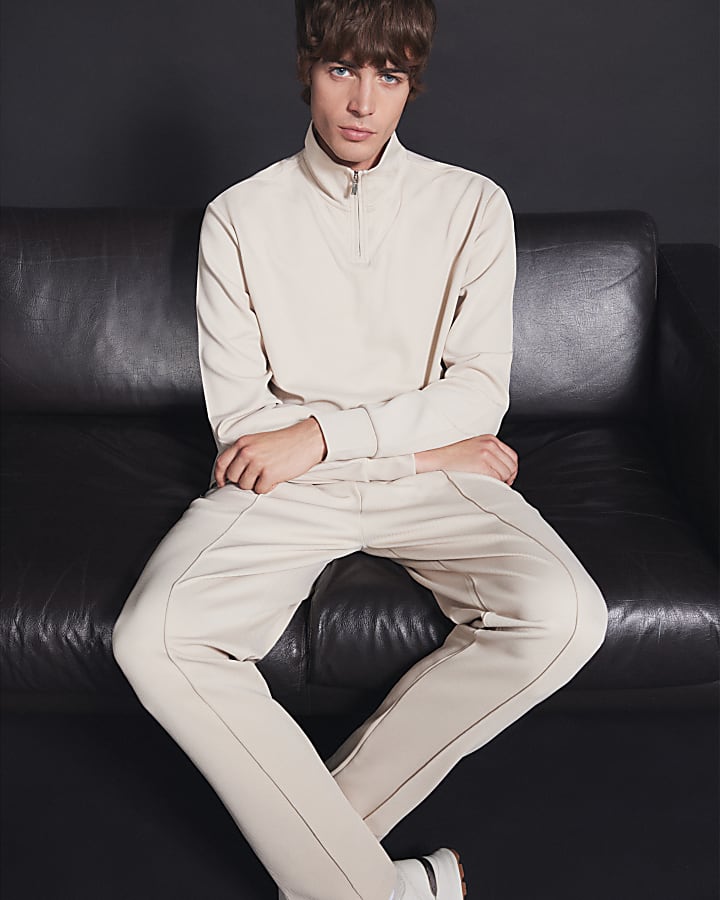 Beige slim fit textured half zip sweatshirt
