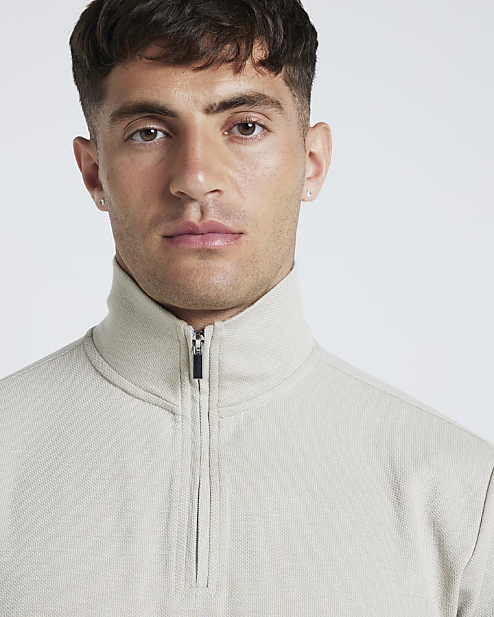 Beige slim fit textured half zip sweatshirt