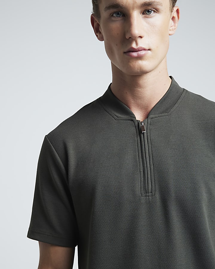 Khaki slim fit textured half zip polo