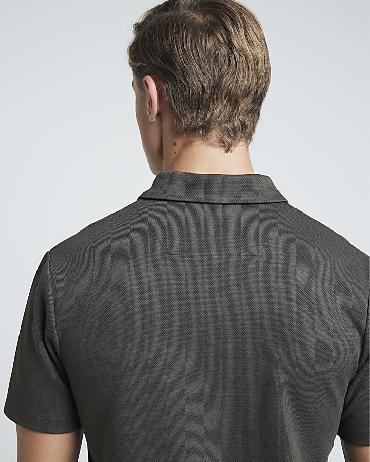 Khaki slim fit stretch textured half zip polo