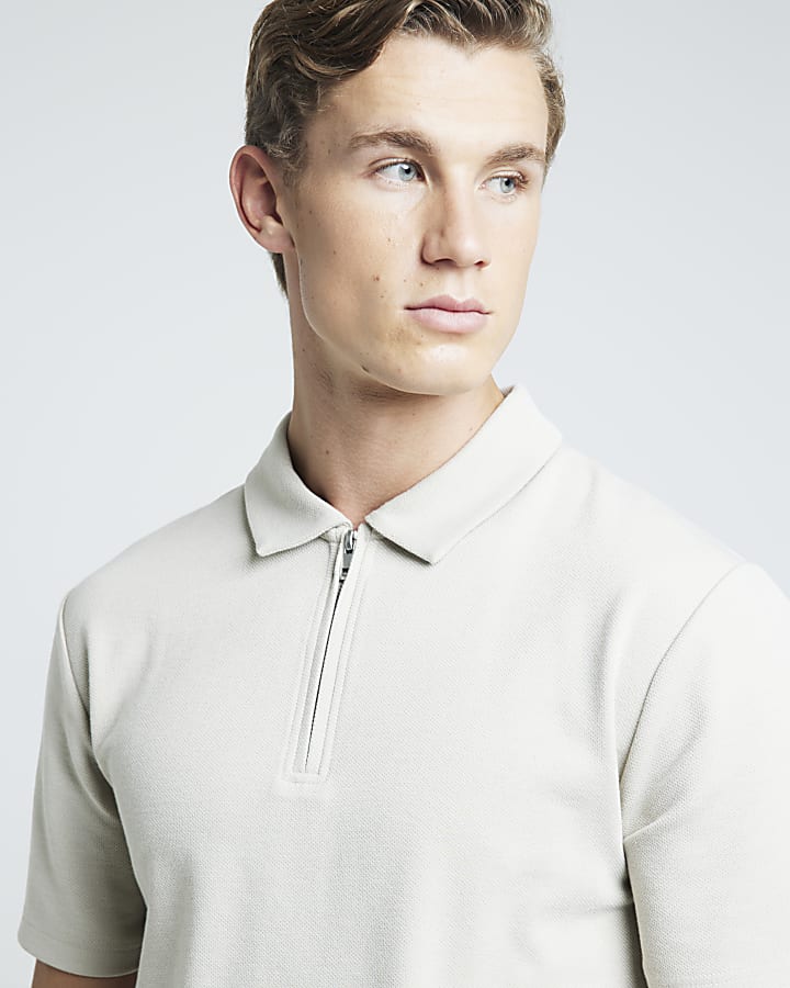 Stone slim fit textured half zip polo
