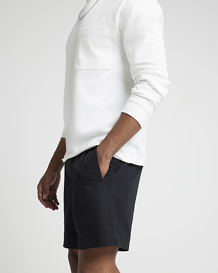 Black regular fit textured pull on shorts