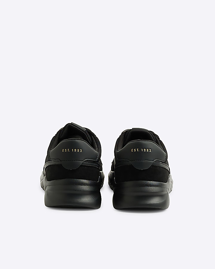 Black runner trainers