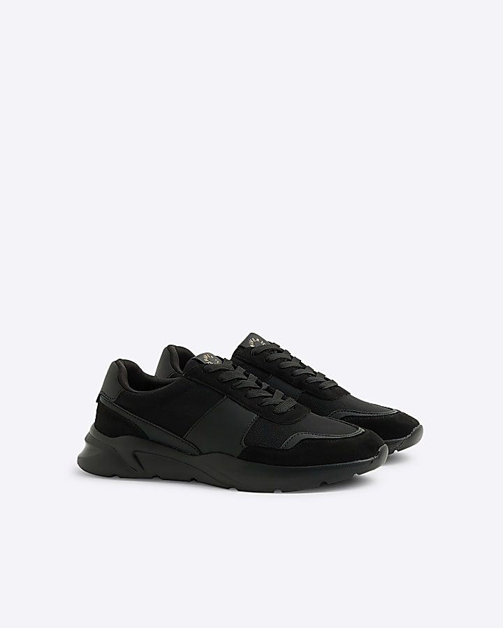 Black runner trainers
