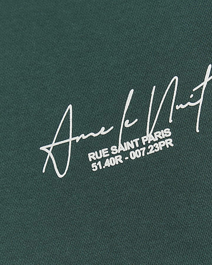 Green regular fit graphic half zip sweatshirt