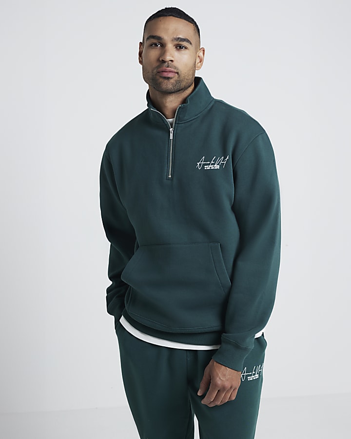 Green regular fit graphic half zip sweatshirt