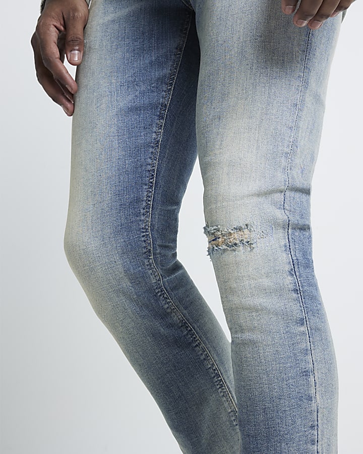 Blue skinny fit ripped jeans
