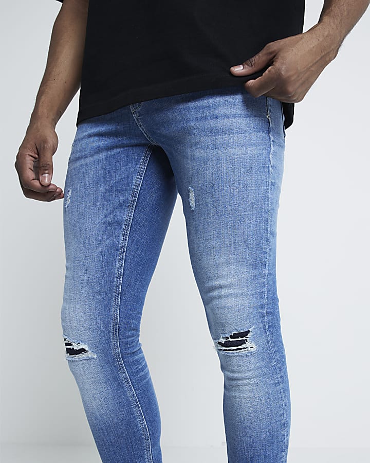 Blue Super Skinny Spray On Ripped Jeans