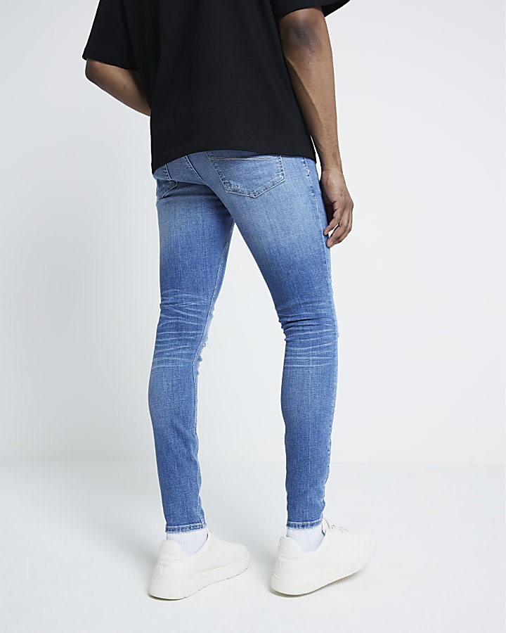 Blue Super Skinny Spray On Ripped Jeans