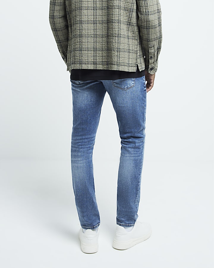 Blue ripped skinny jeans