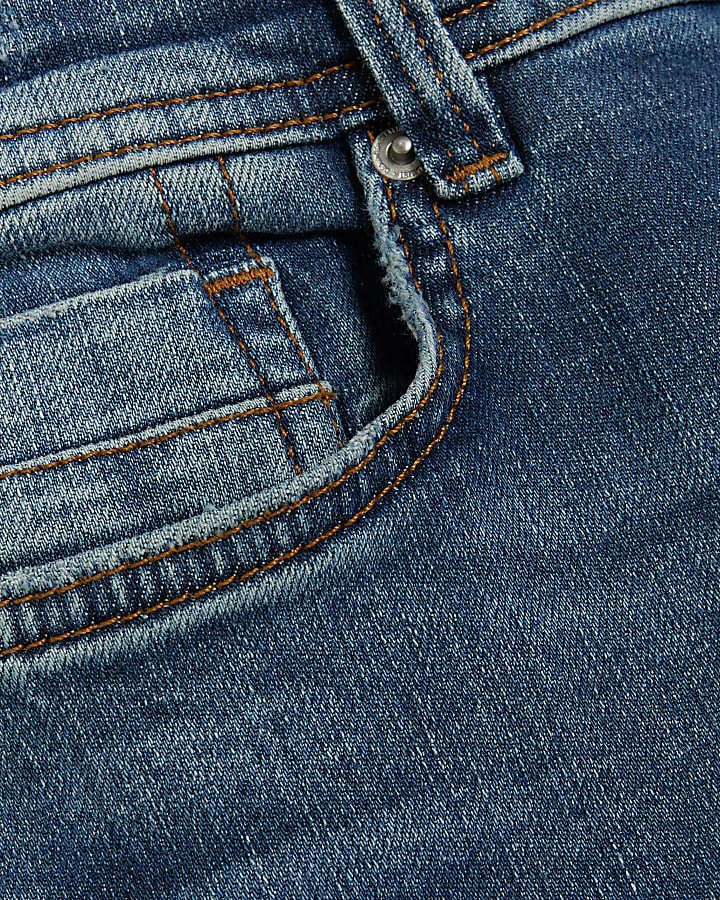 Blue ripped skinny jeans