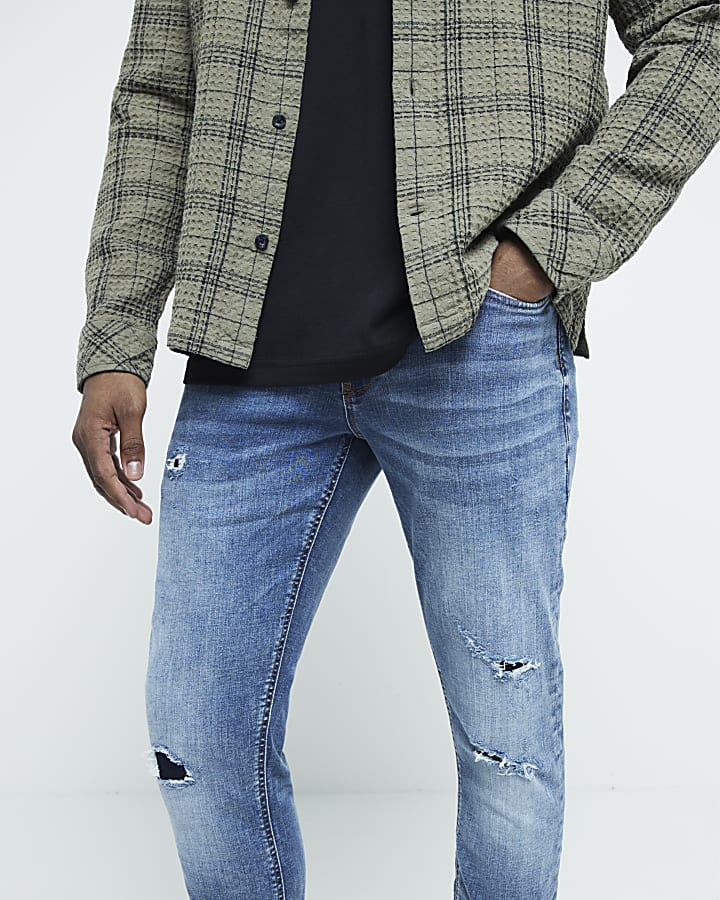 Blue ripped skinny jeans