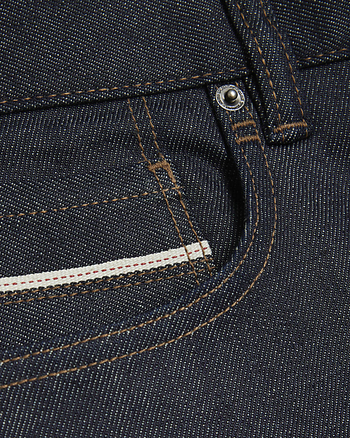 Dark blue selvedge slim jeans with rolled hem