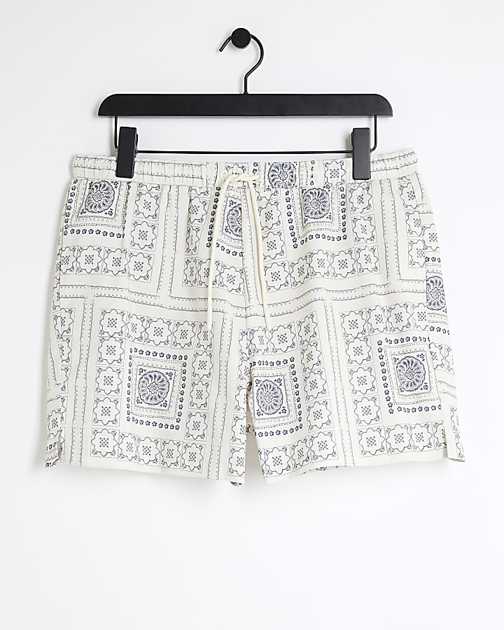 Beige regular fit tile graphic swim shorts