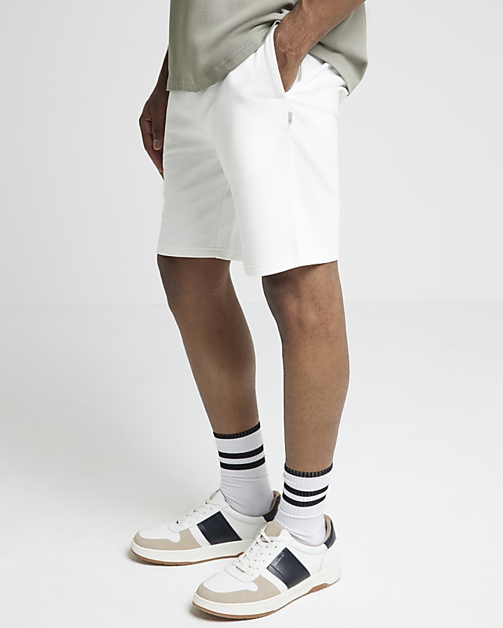 Beige slim fit jersey shorts