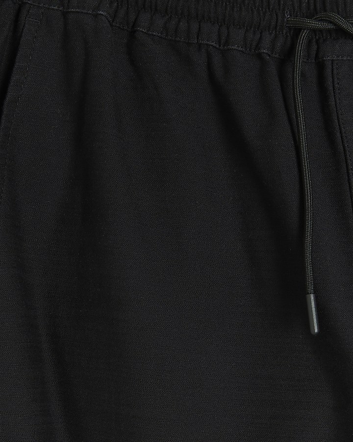 Black tapered fit pull on trousers