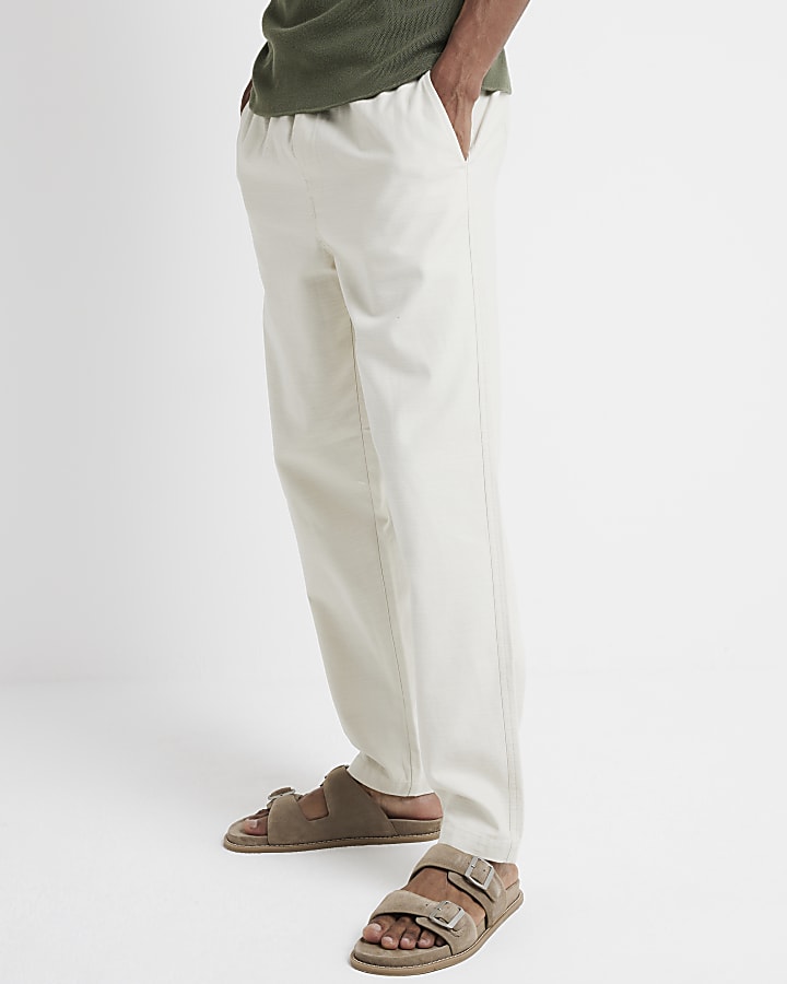 Beige tapered fit pull on trousers