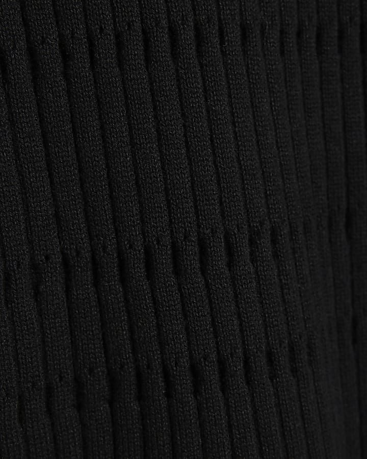 Black slim fit stretch textured knit polo