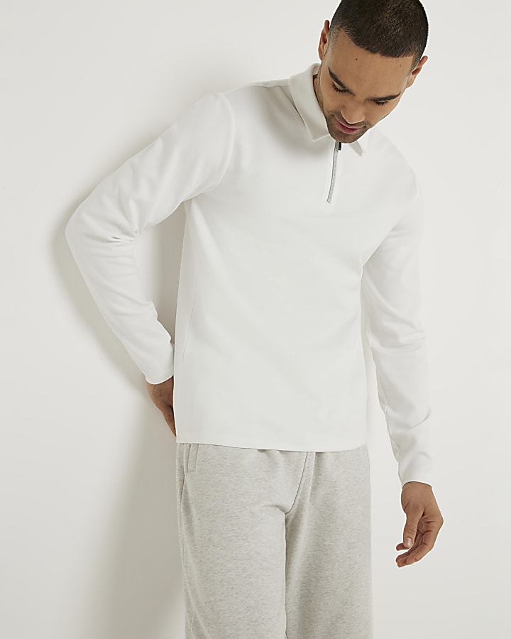 Beige slim fit textured half zip polo