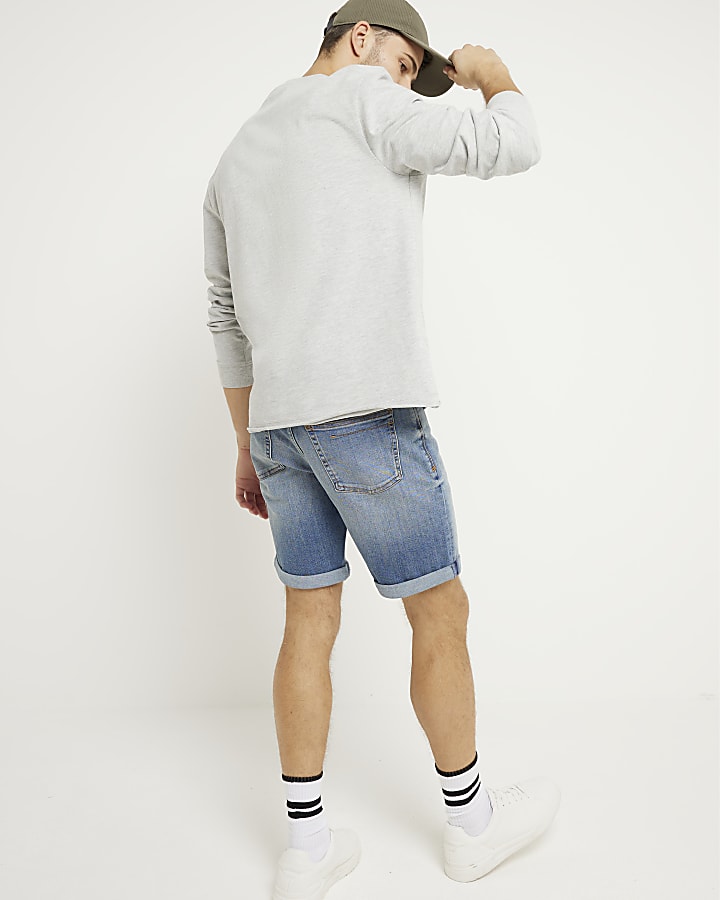 Blue skinny fit ripped denim shorts