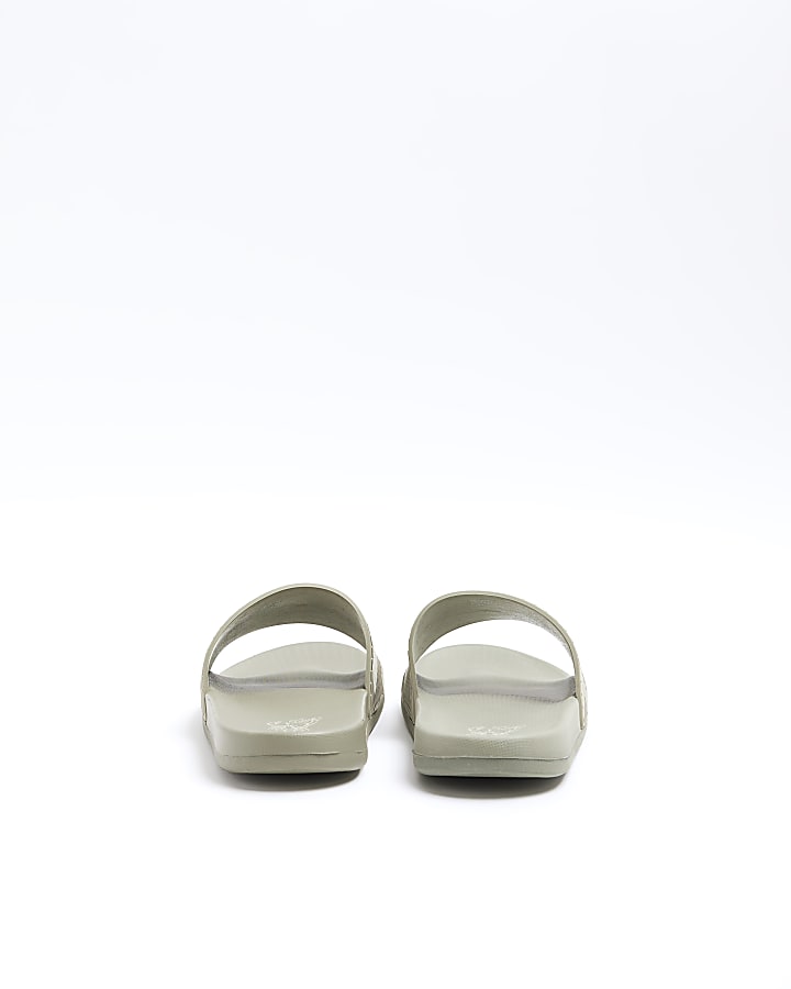 Green embossed geometric sliders