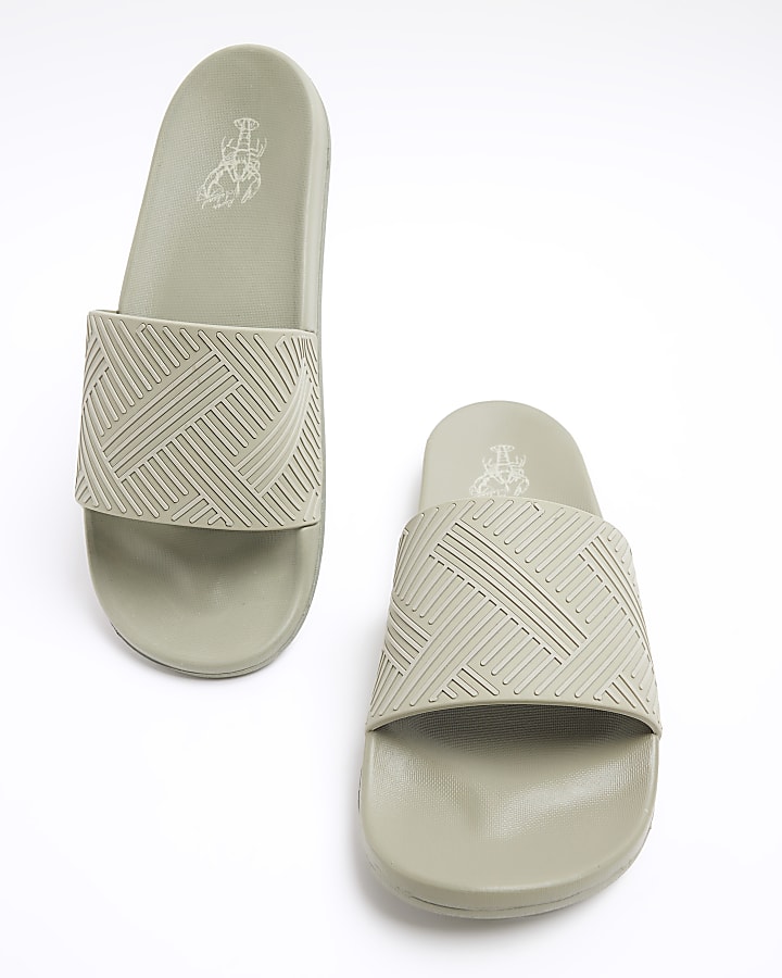 Green embossed geometric sliders