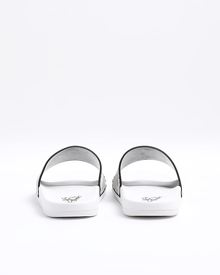 White embossed geometric sliders